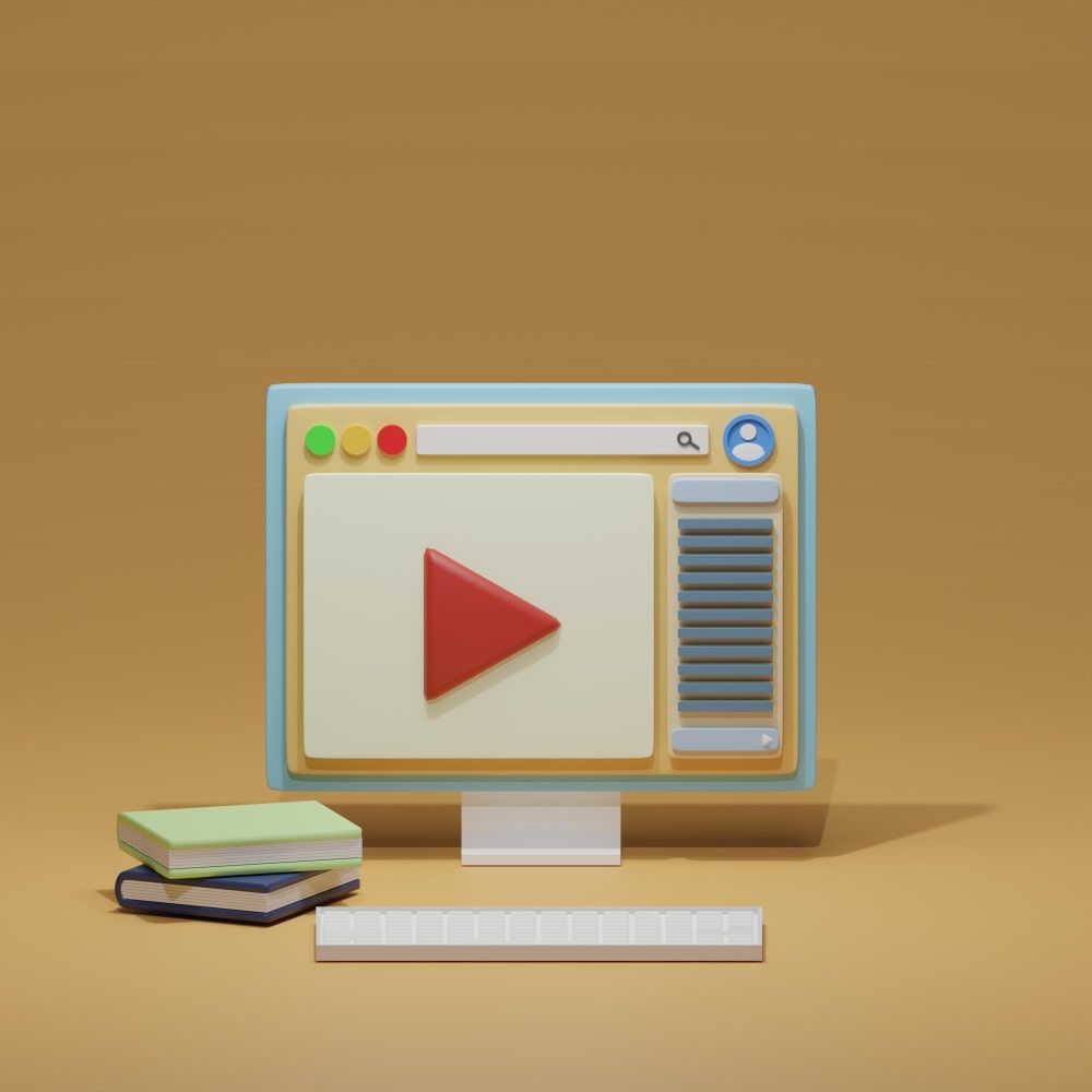 شاشة كمبيوتر وكتب