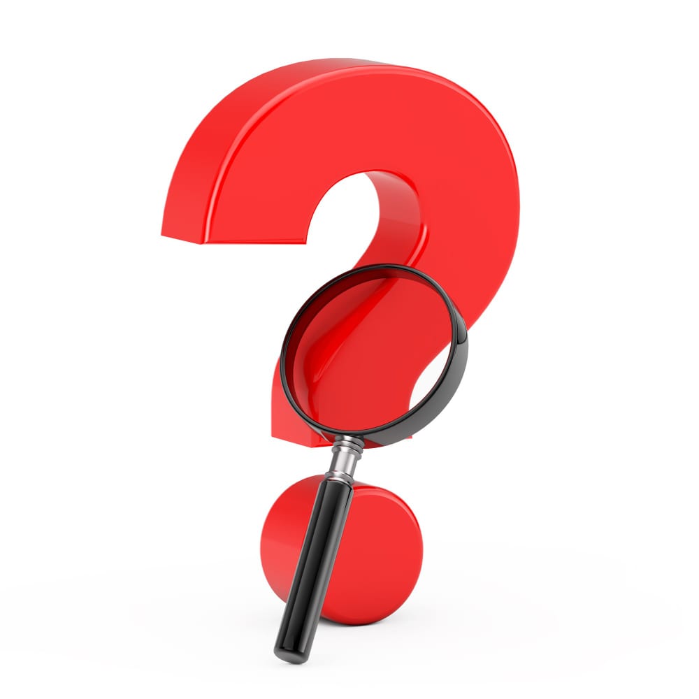 علامة استفهام وعدسة مكبرة