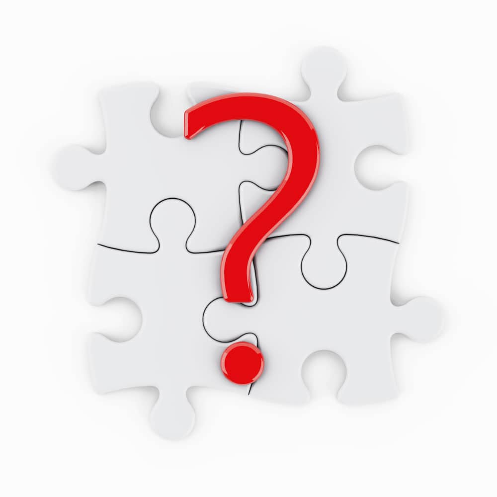 علامة استفهام حمراء مرسومة على قطع بازل