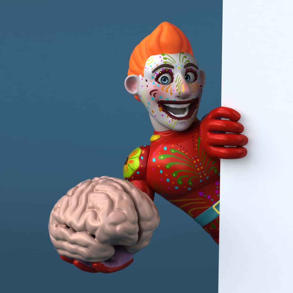 مهرج يحمل مجسم مخ مهرج يحمل مجسم مخ